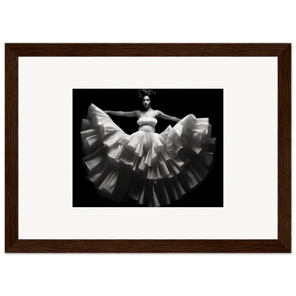 Framed black and white photograph of a dancer in a flowing, ruffled dress.