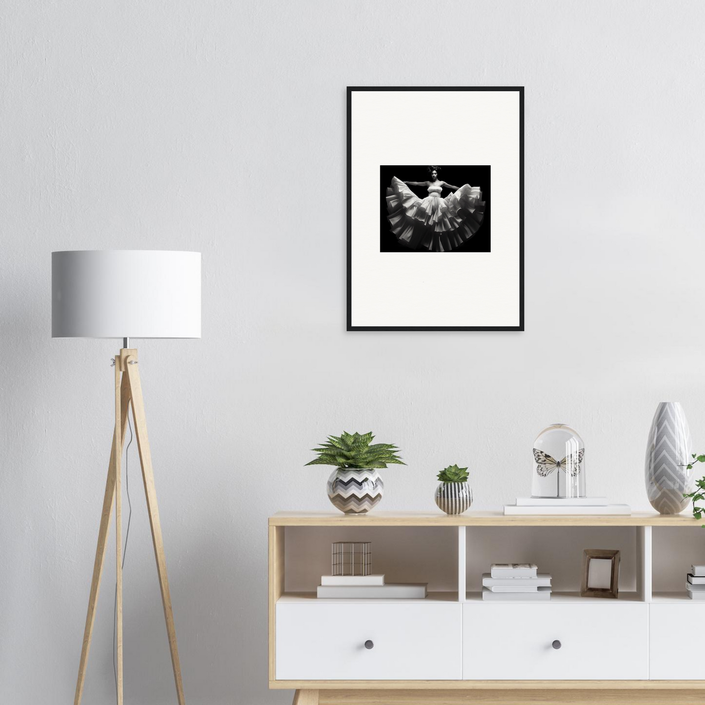 Framed black and white photograph of a bird with outstretched wings.