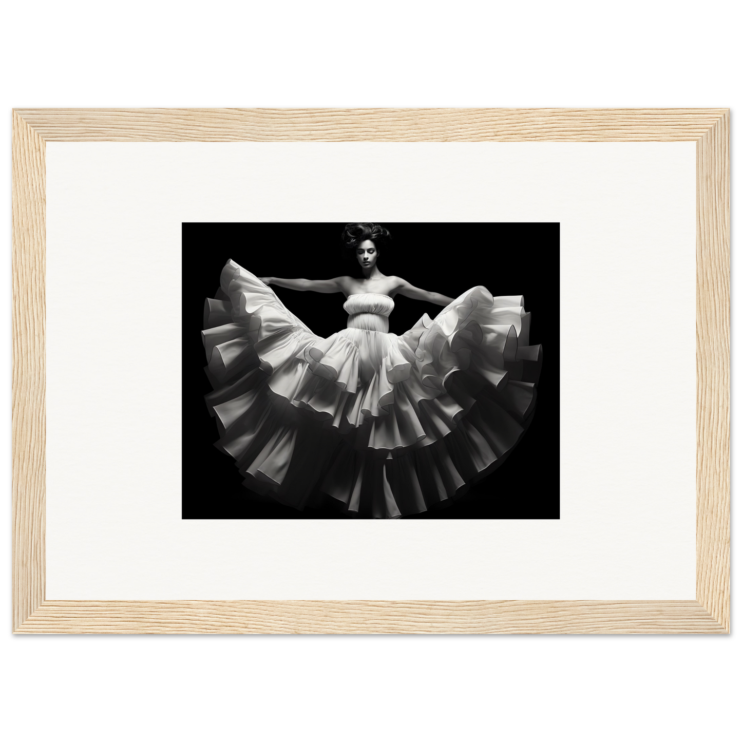 Black and white photograph of a dancer in a flowing, ruffled dress with outstretched arms.