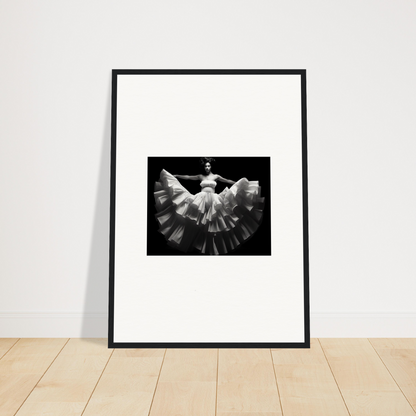 Framed black and white photograph of a dancer in a flowing dress.