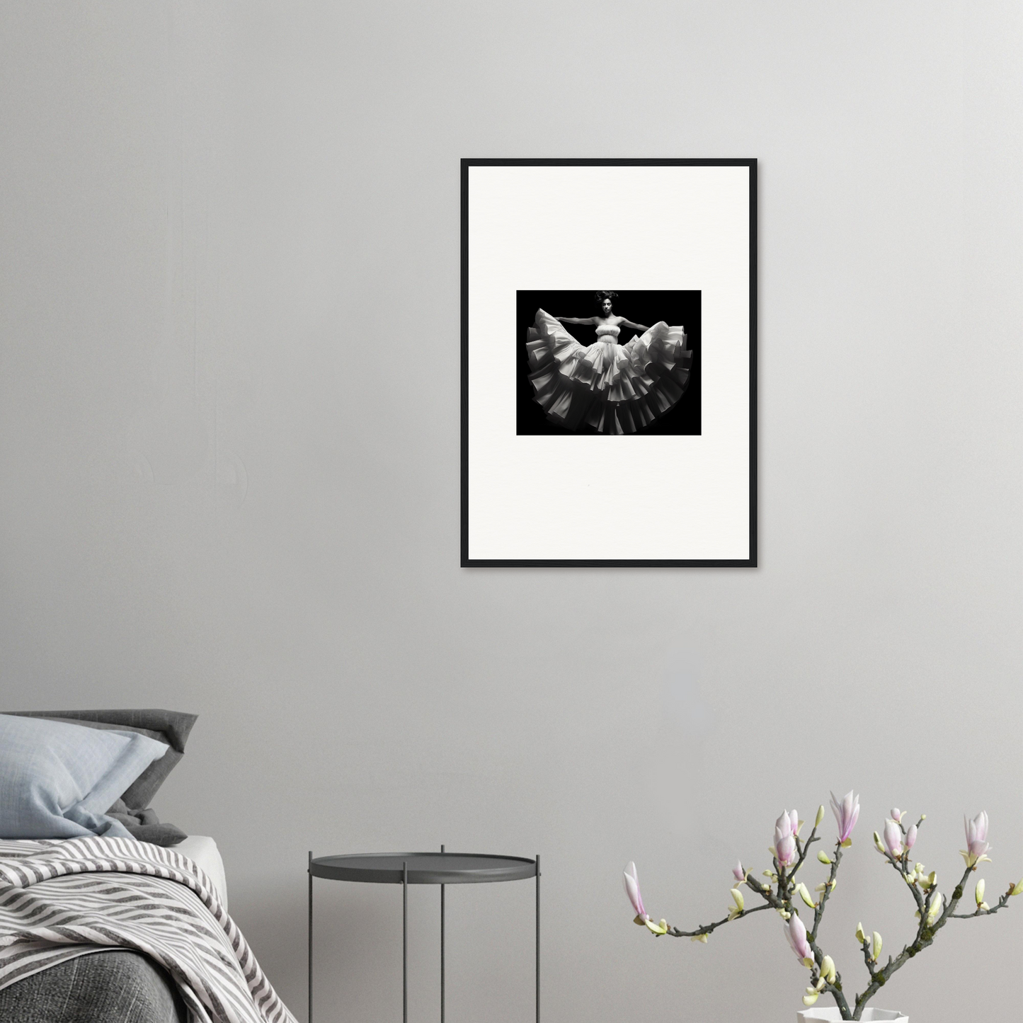 Framed black and white photograph of a blooming flower.