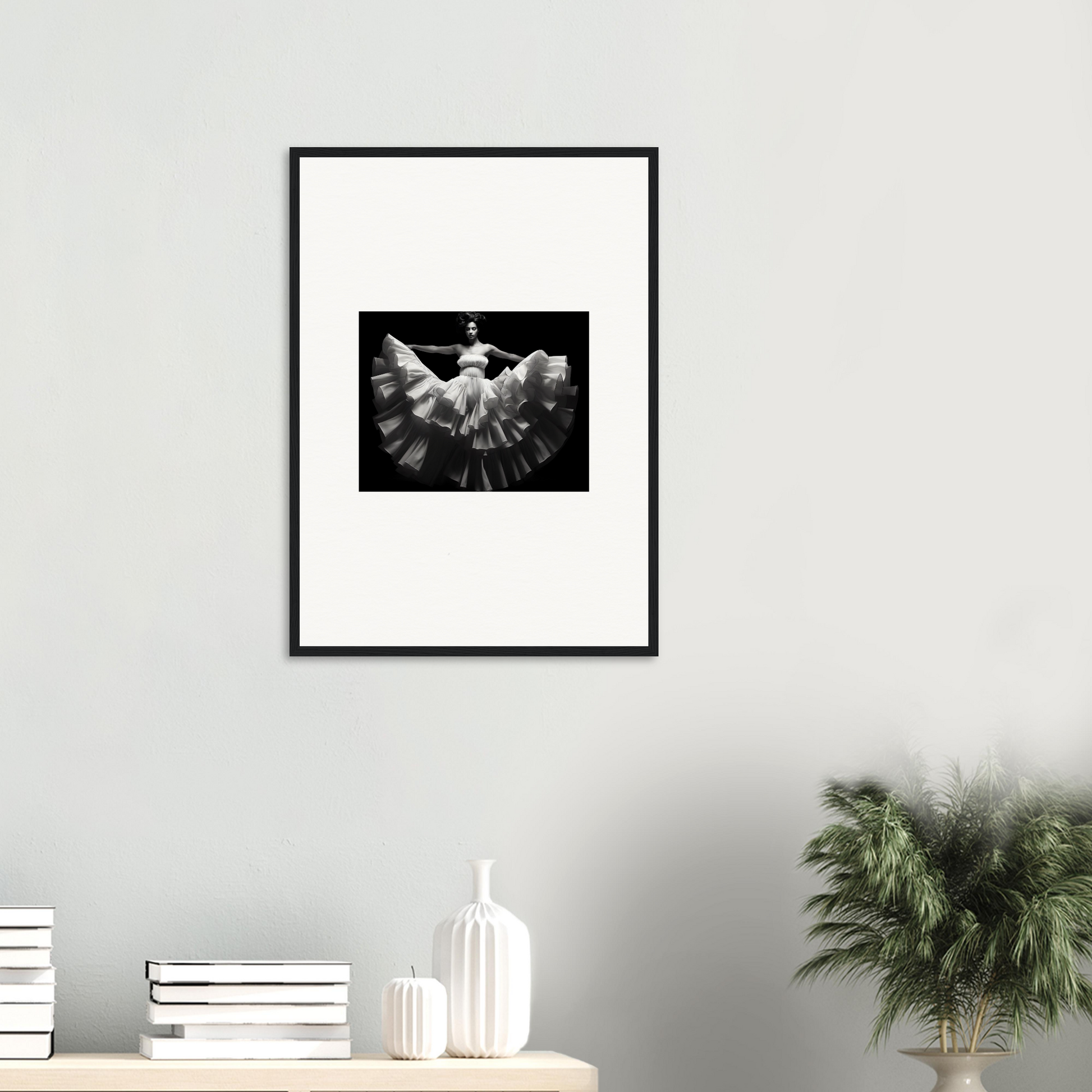 Framed black and white photograph of a bird with outstretched wings.