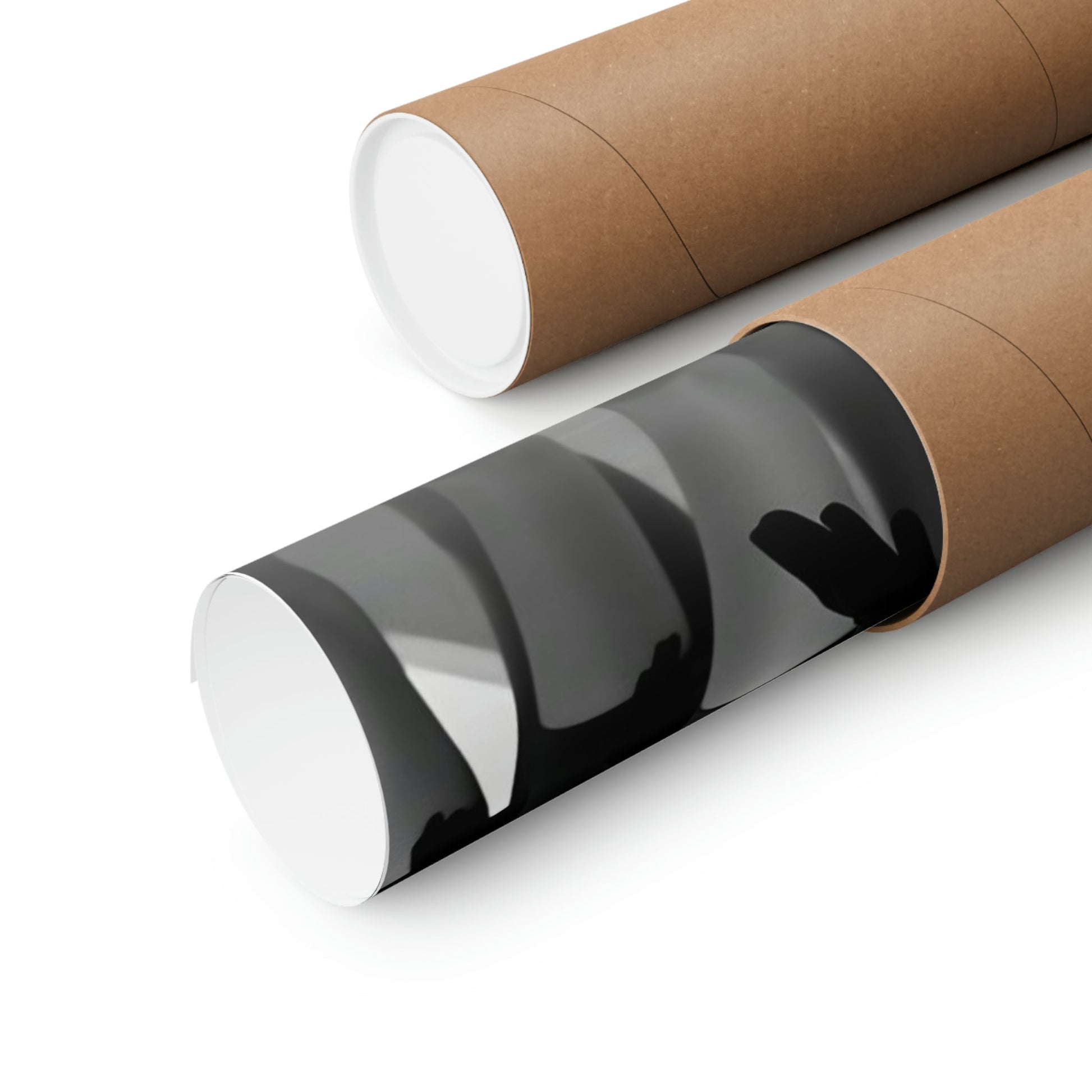 Two rolls of brown paper with black and white paper