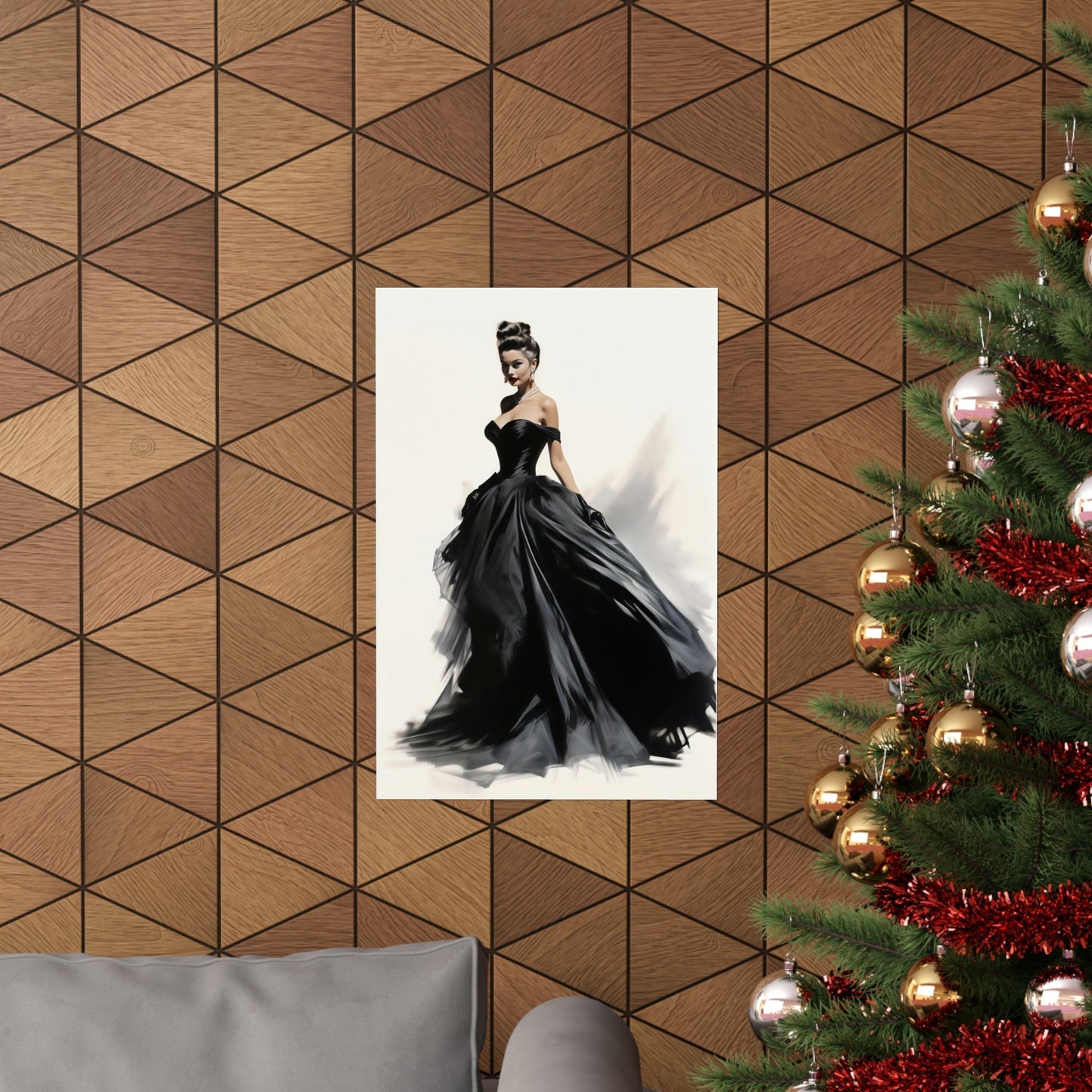 A christmas tree with a picture of a woman in a black dress