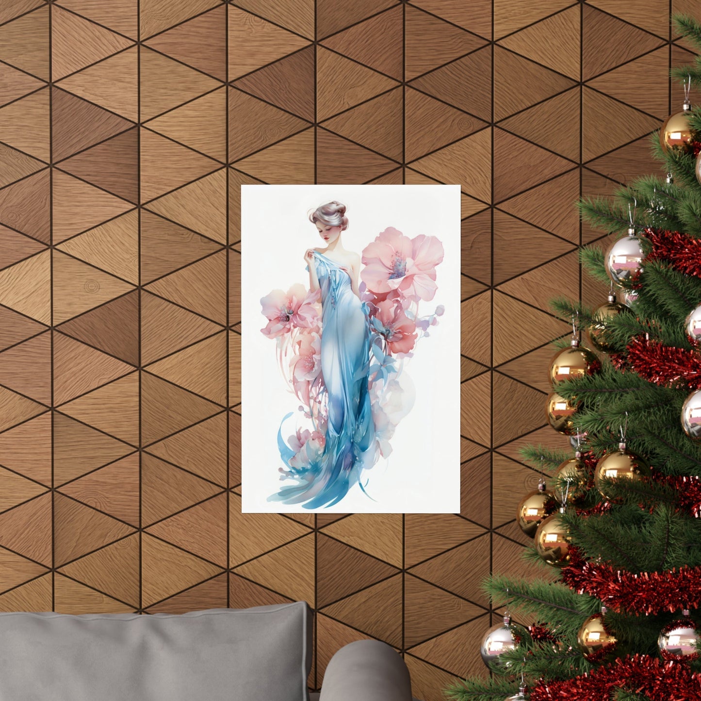 A christmas tree with a painting of a woman in a blue dress