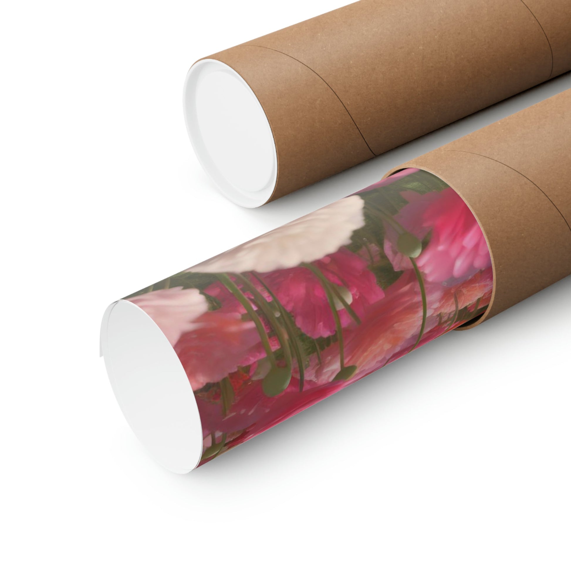 Two rolls of toilet paper with pink flowers on them