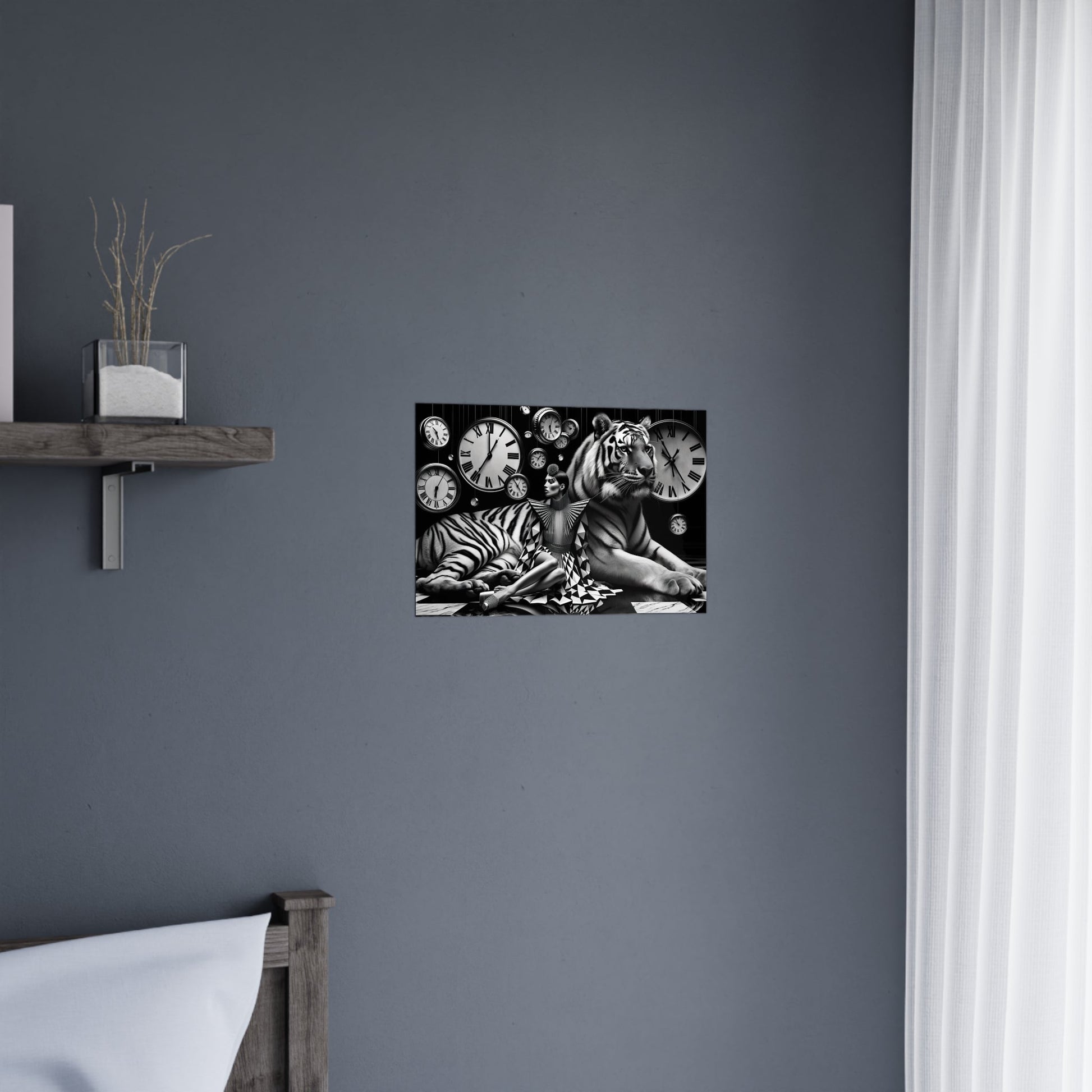 Black and white photograph of tigers hanging on a gray wall.