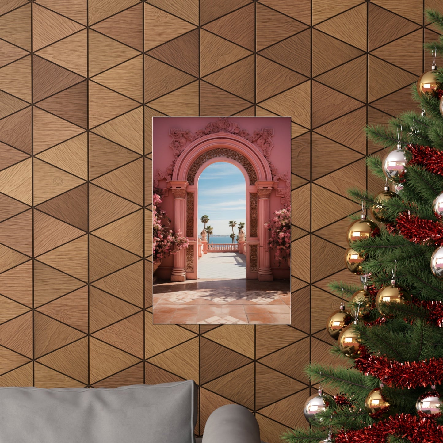 Framed photograph of an ornate pink archway overlooking a seaside view.