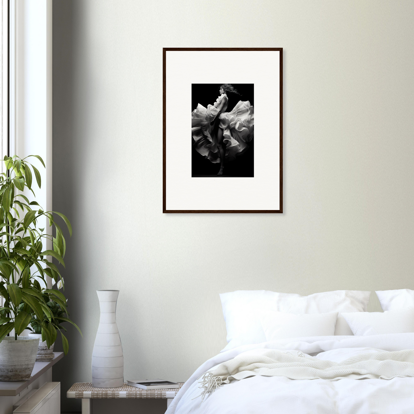 Framed black and white photograph of a flower in bloom.