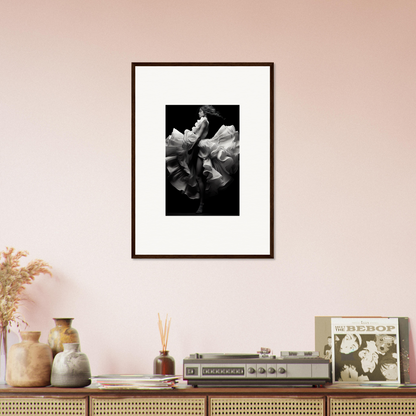 Framed black and white photograph of a flower in bloom.