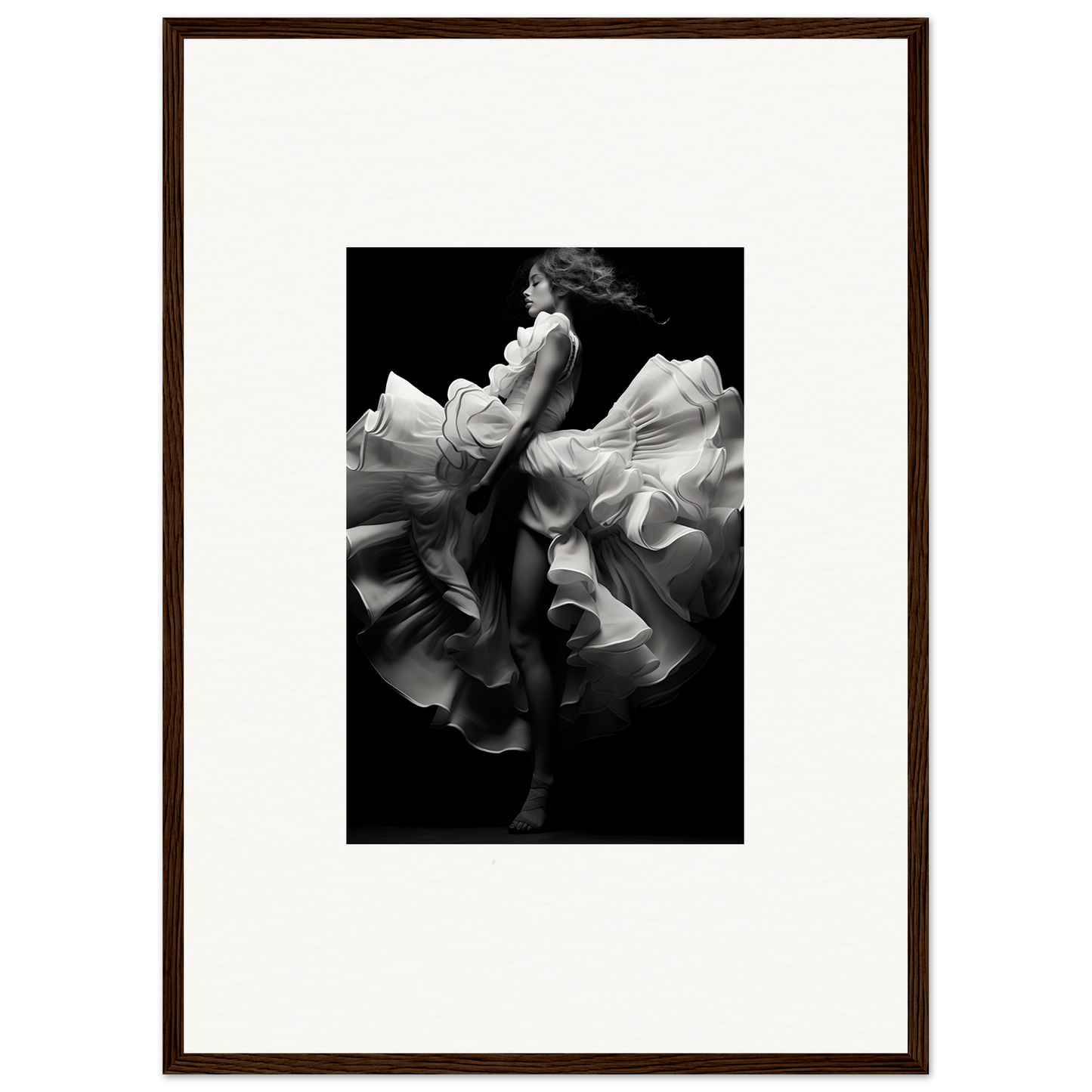 Black and white photograph of a dancer in flowing fabric captured mid-motion.