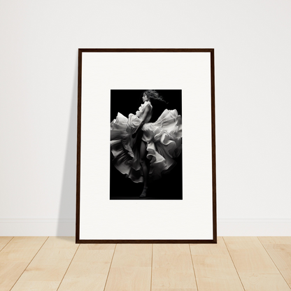 Framed black and white photograph of a delicate flower blossom.