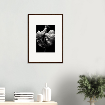 Framed black and white photograph of a flower in bloom.