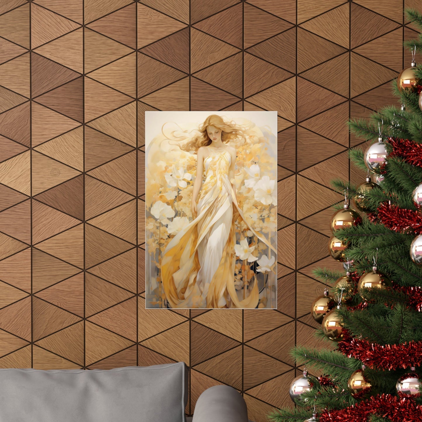 A christmas tree with a gold and white angel painting on it