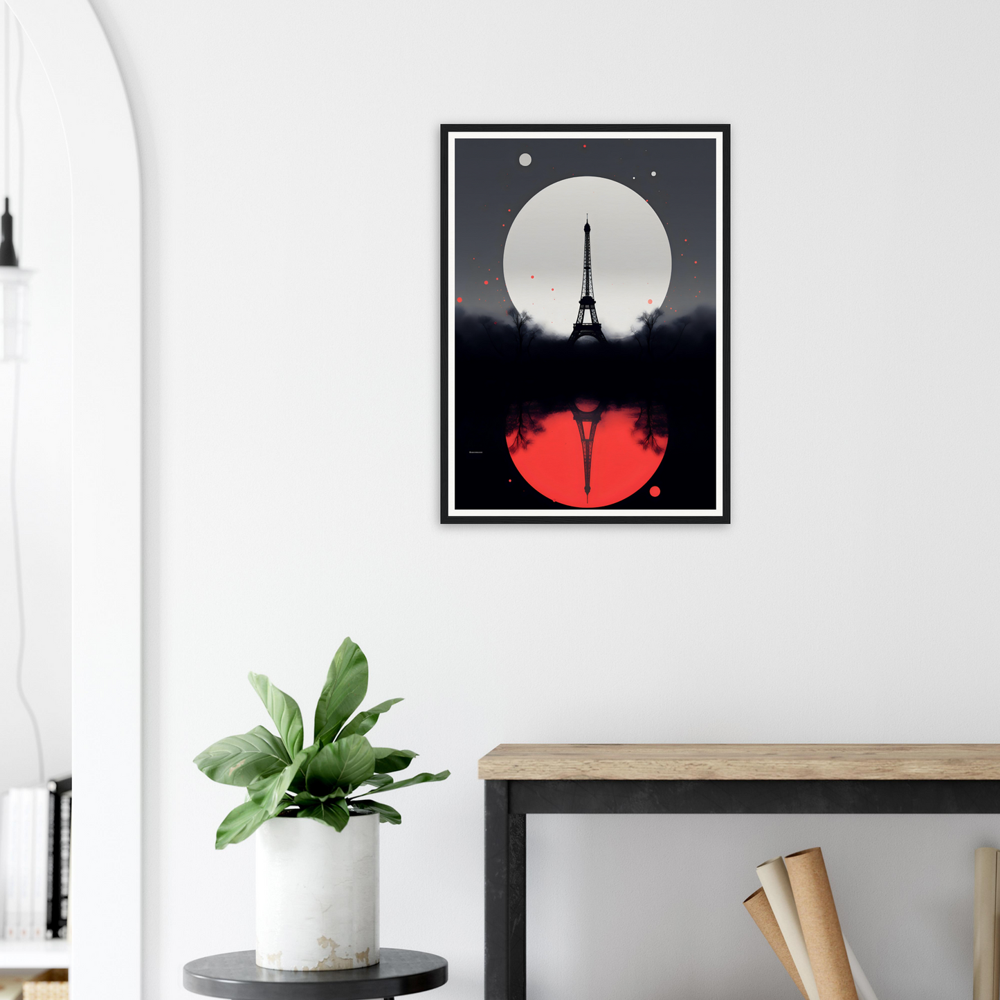 A poster with a red moon and a black silhouette of a tower