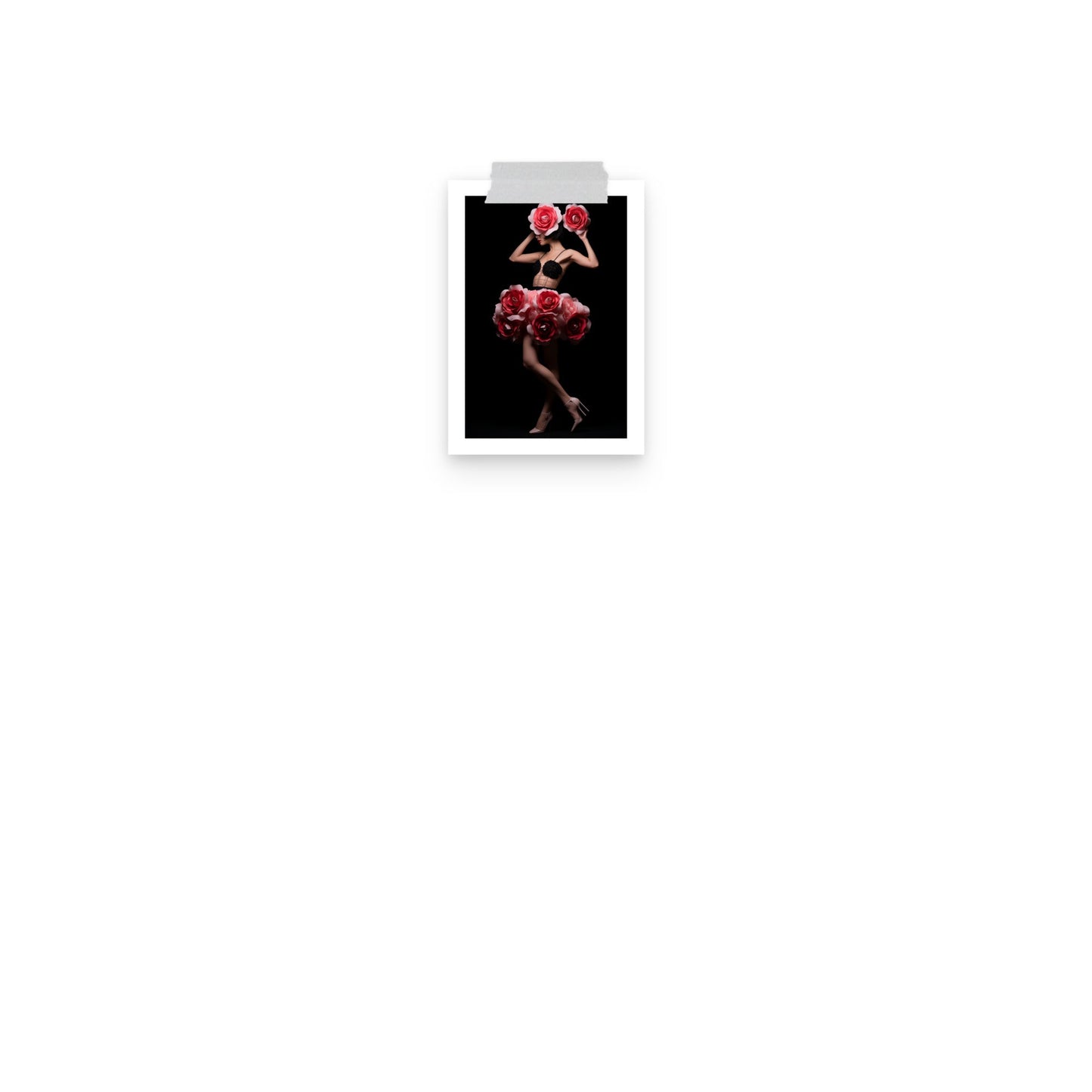 A red ballerina in a black background