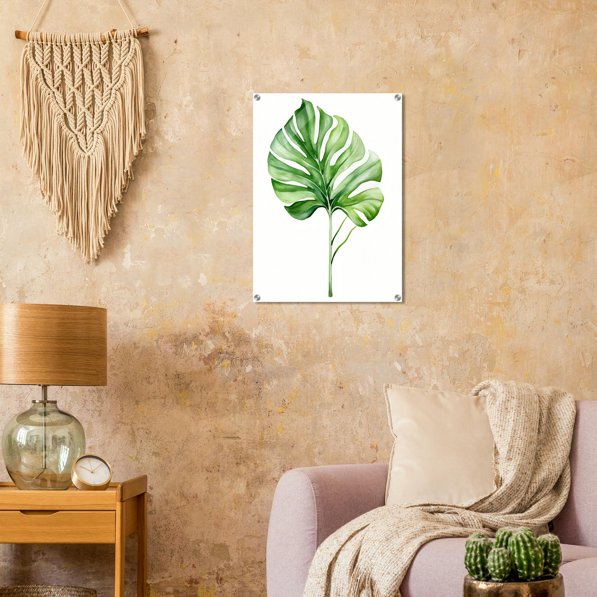 A living room with a couch and a large green leaf