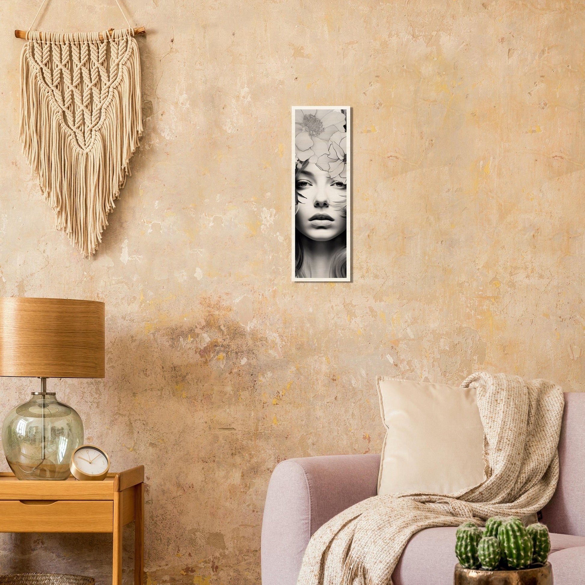 A living room with a couch, a table and a wall hanging