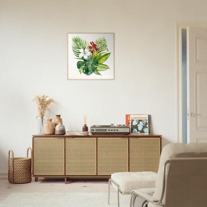 A living room with a white couch and a large green leaf print on the wall