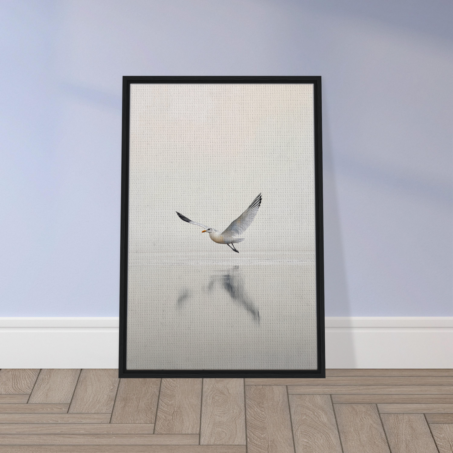 Framed artwork of a flying bird and water reflection from Seagull Mist Serenade for room decor