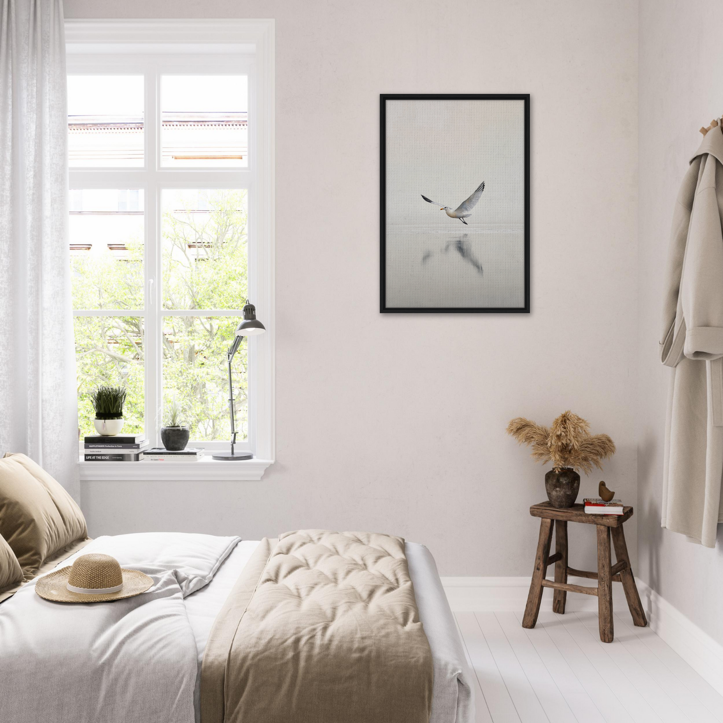 Bright airy bedroom in neutral tones featuring Seagull Mist Serenade framed canvas print