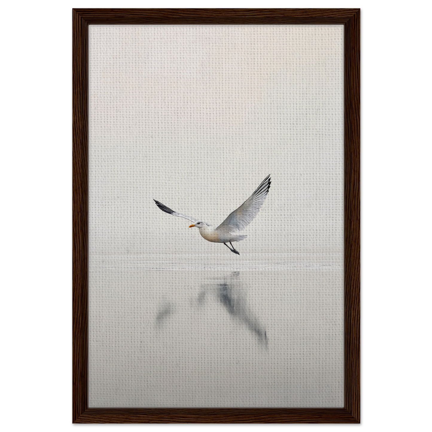 Seagull with outstretched wings reflecting in water from Seagull Mist Serenade framed canvas print