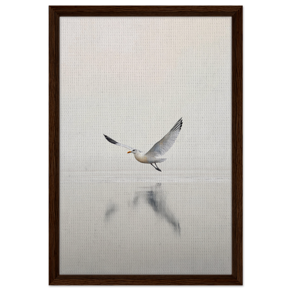 Seagull with outstretched wings reflecting in water from Seagull Mist Serenade framed canvas print