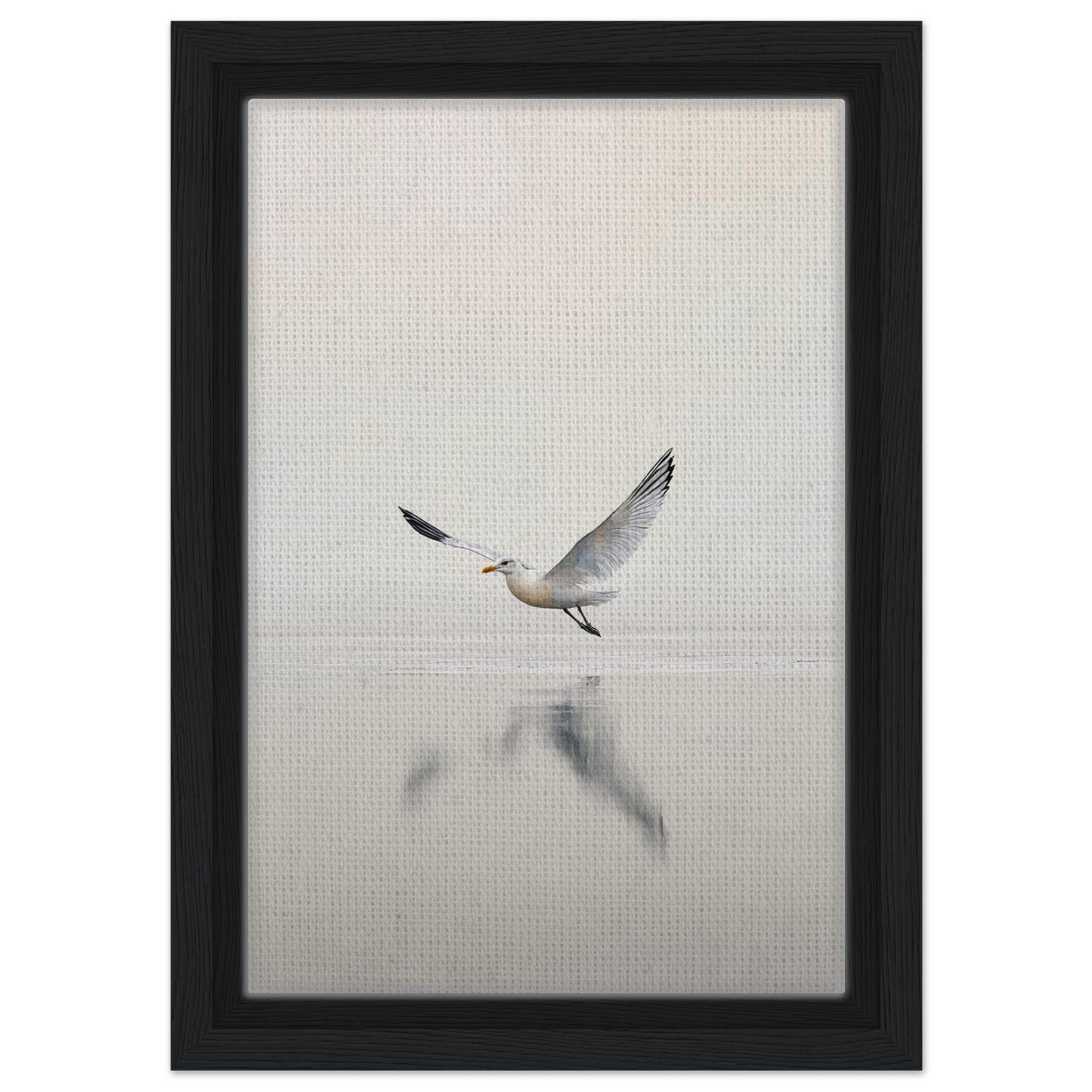 Seagull with outstretched wings above water in Seagull Mist Serenade framed canvas print