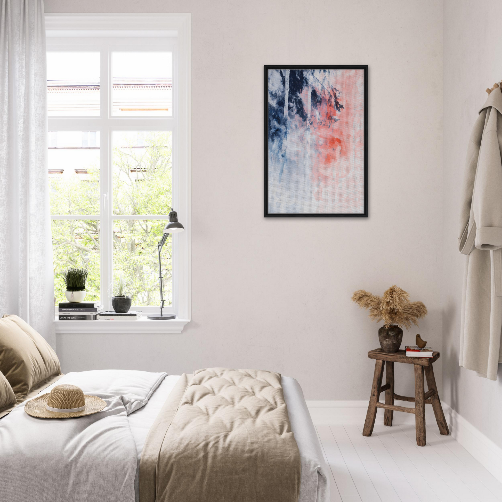 Bright, airy bedroom featuring exclusive framed canvas Serenade in Chaos and white decor