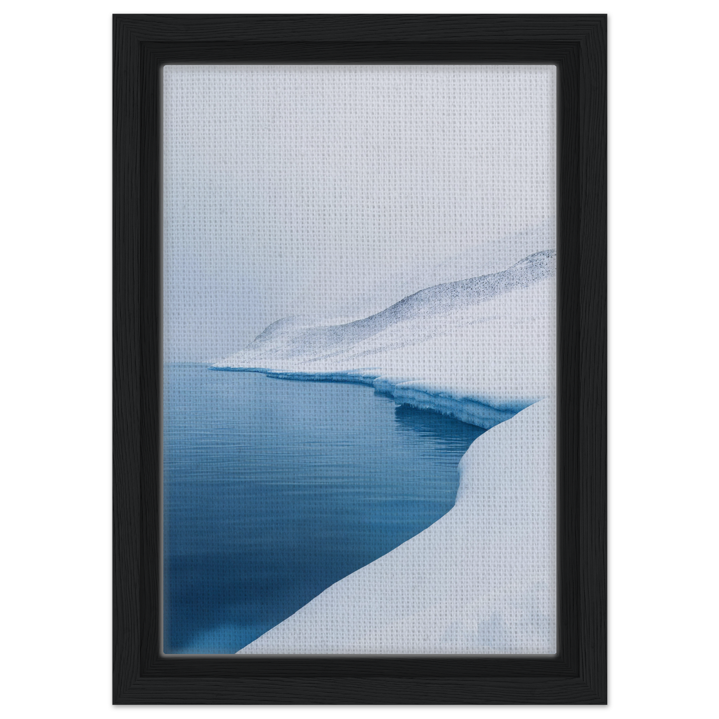 Framed photograph of a snowy landscape with a blue river, perfect for Serene Ice Reverie room decor