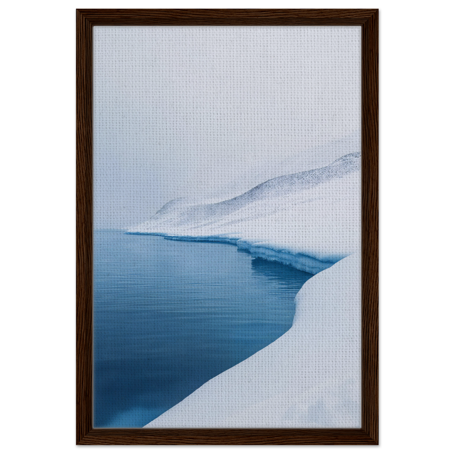 Framed canvas print of a snowy landscape and winding river titled Serene Ice Reverie