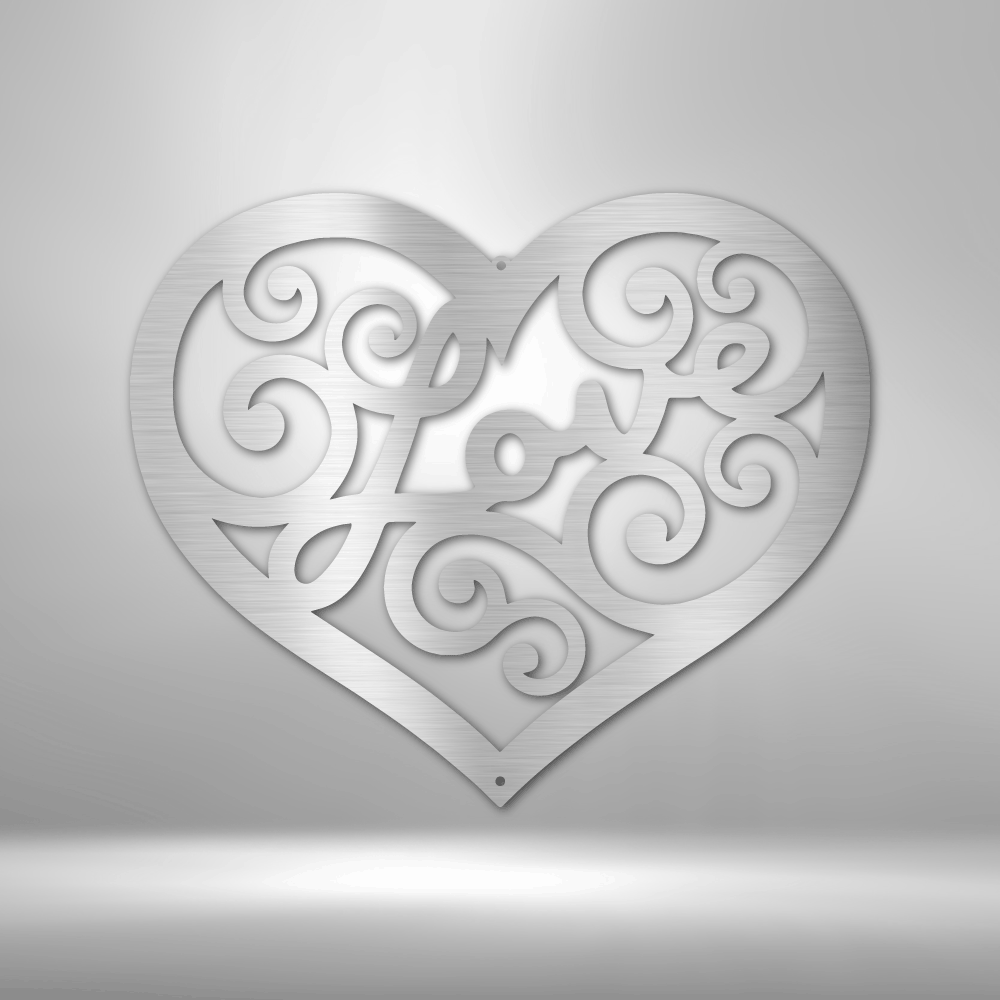 Heart-shaped ornament with intricate swirling patterns and the word ’Love’ incorporated into its design.