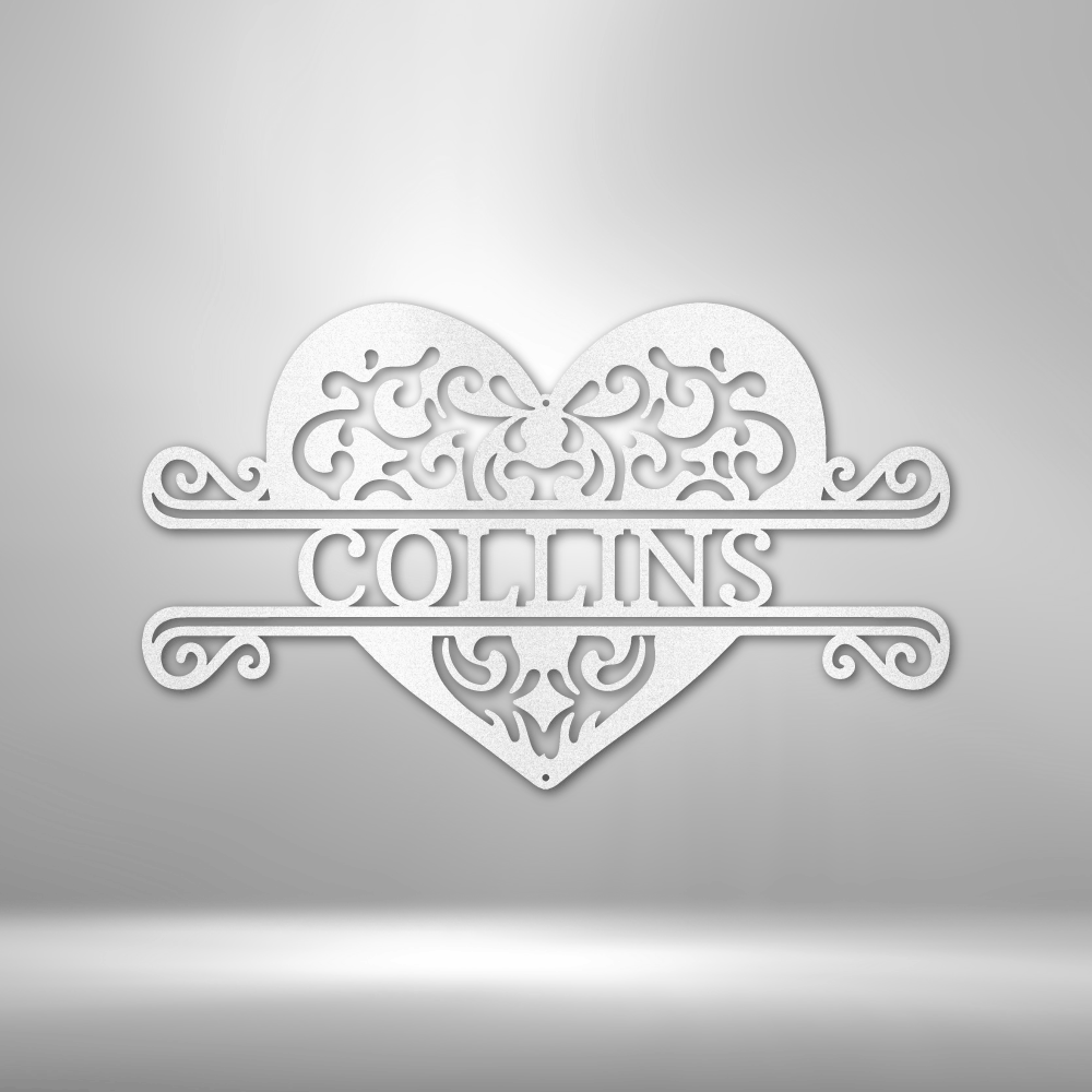 Ornate heart-shaped design with ’COLLINS’ text and decorative scrollwork.