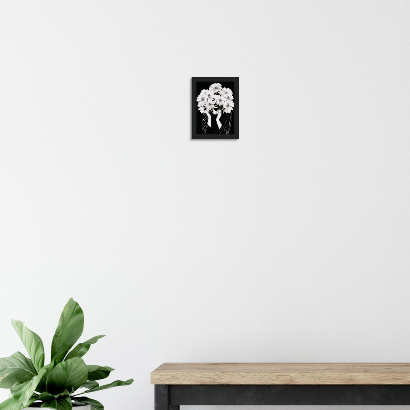 Framed black and white photograph of a bouquet of flowers.