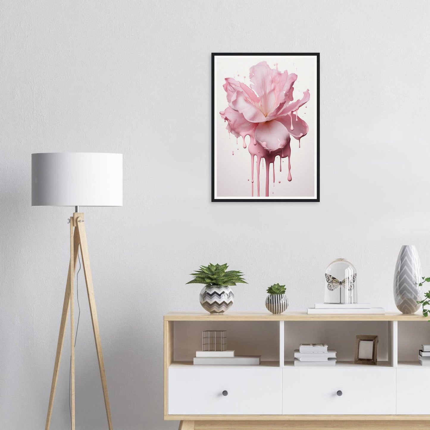 Framed watercolor painting of a pink flower with dripping paint effect.