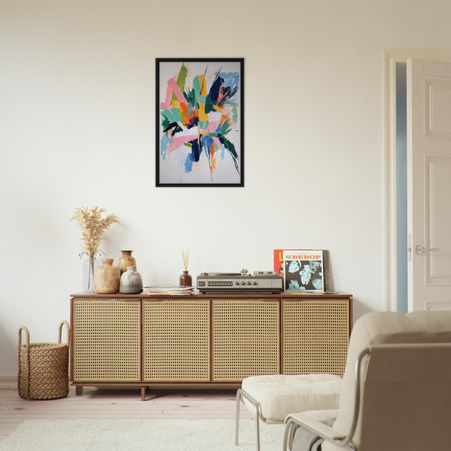 Wooden sideboard with cane-webbed doors featuring decorative items from Teal Dream Eruptions