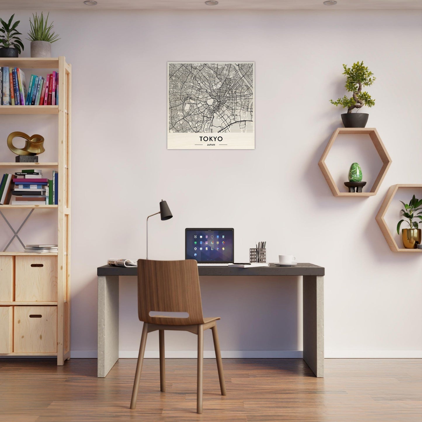 Simple home office workspace with a desk, chair, and decorative wall shelves.