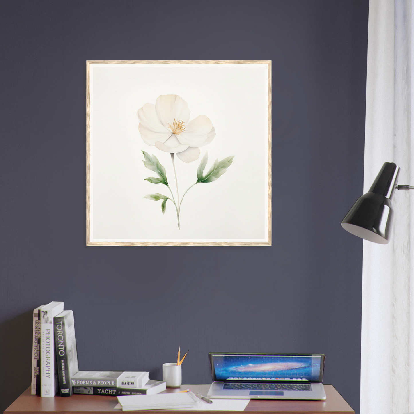 Framed watercolor painting of a delicate white flower with green leaves.