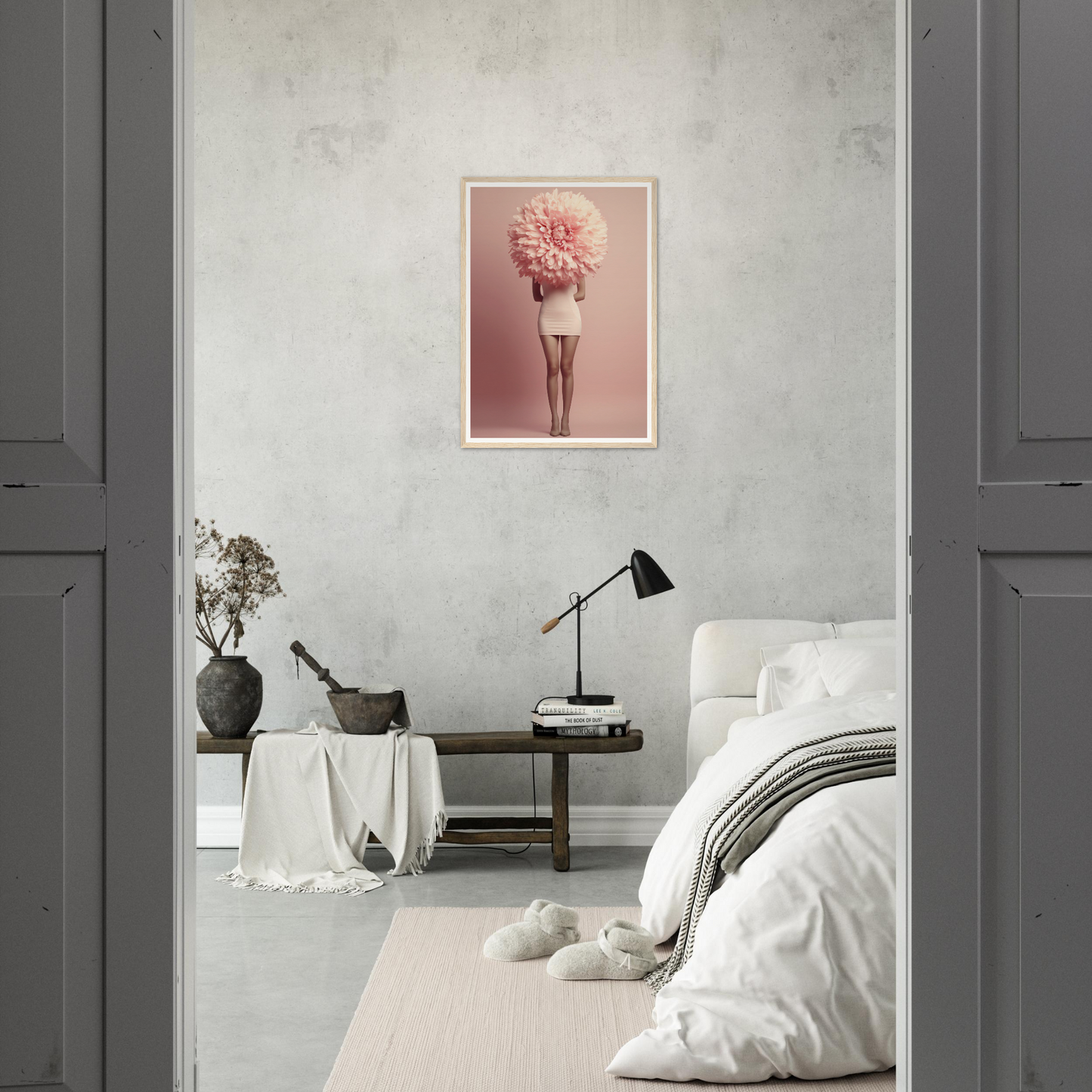 Minimalist bedroom with a pink artistic print on the wall.