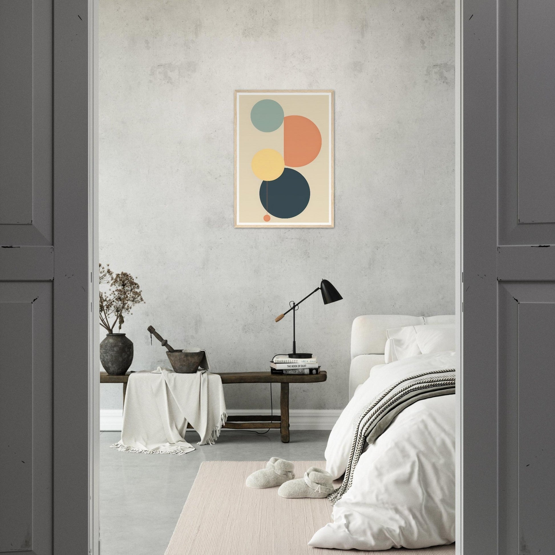 Minimalist abstract artwork featuring three overlapping circles in muted colors.