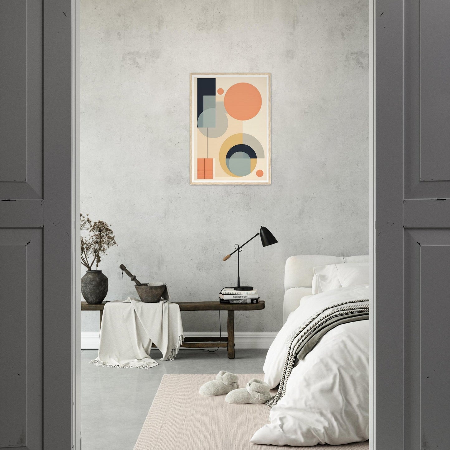 Minimalist bedroom with abstract geometric artwork on the wall.