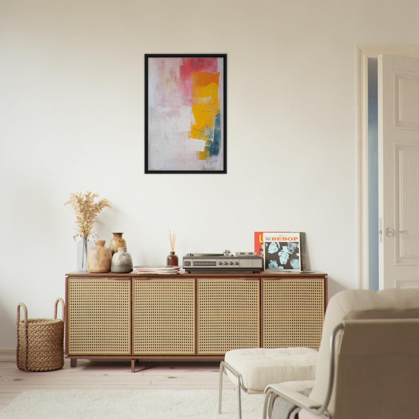 Wooden sideboard with cane-webbed doors, styled with decorative items for Cosmic Euphoria