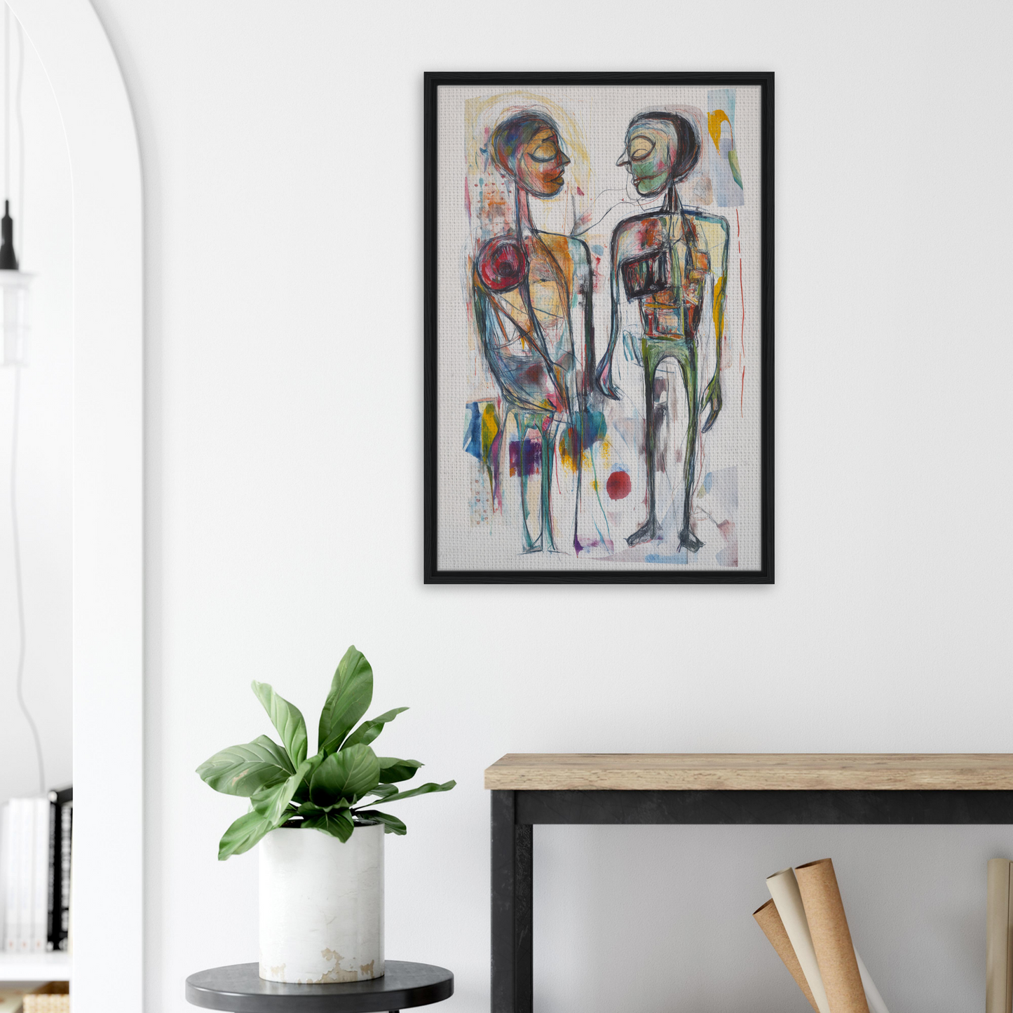 Abstract painting of two stylized figures in black frame for Vibrant Emotional Dialogues room decor