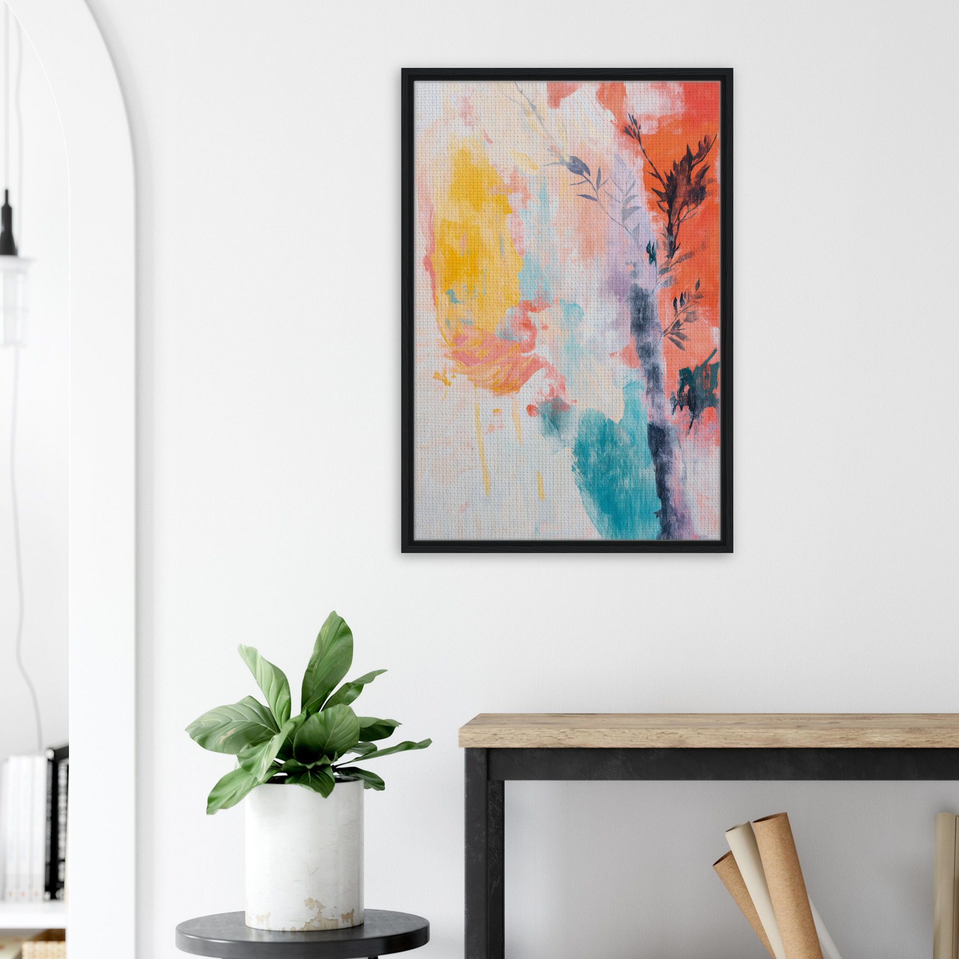 Abstract painting featuring vibrant splashes in a black frame, perfect for room decor