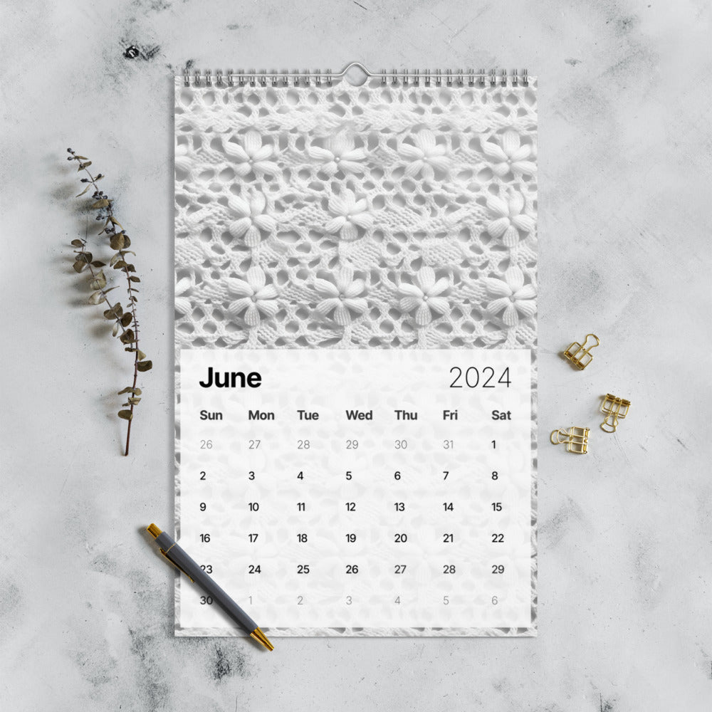 June 2024 calendar page with decorative lace-like pattern above.