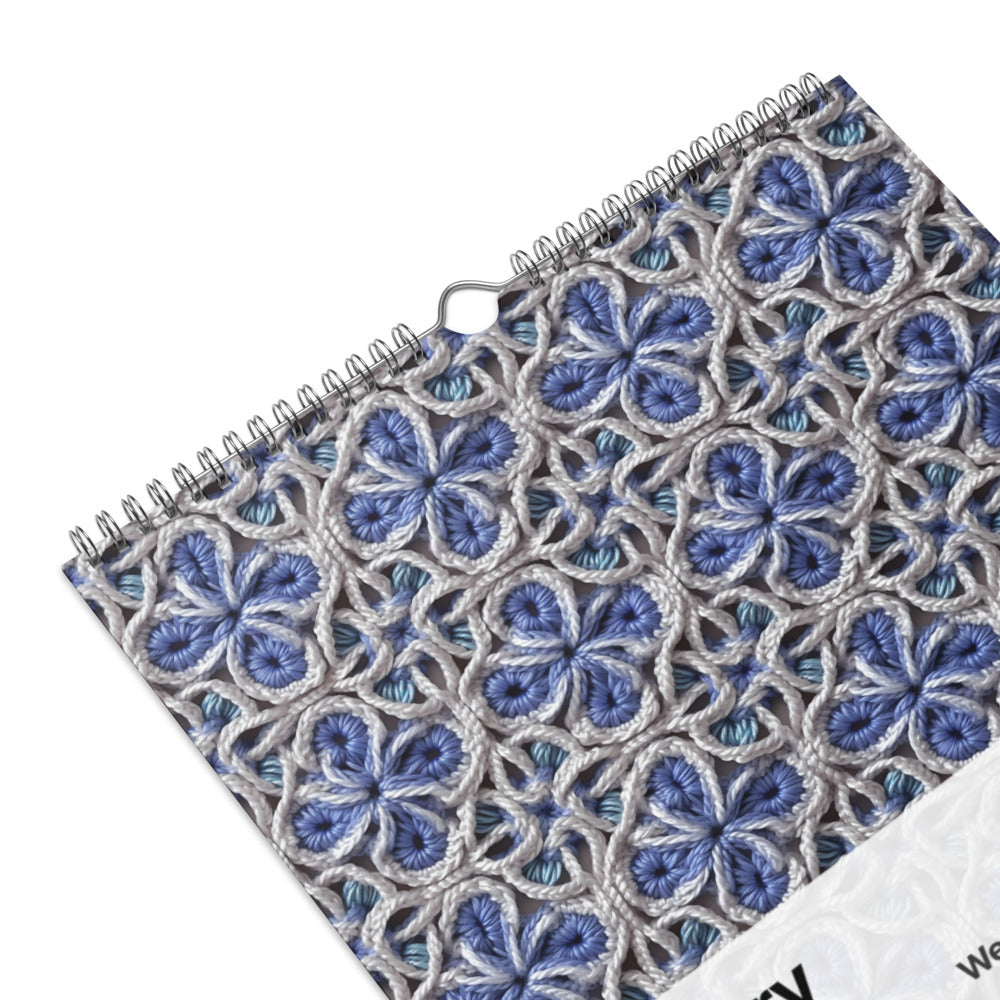 Spiral-bound notebook with a blue and gray floral pattern cover.