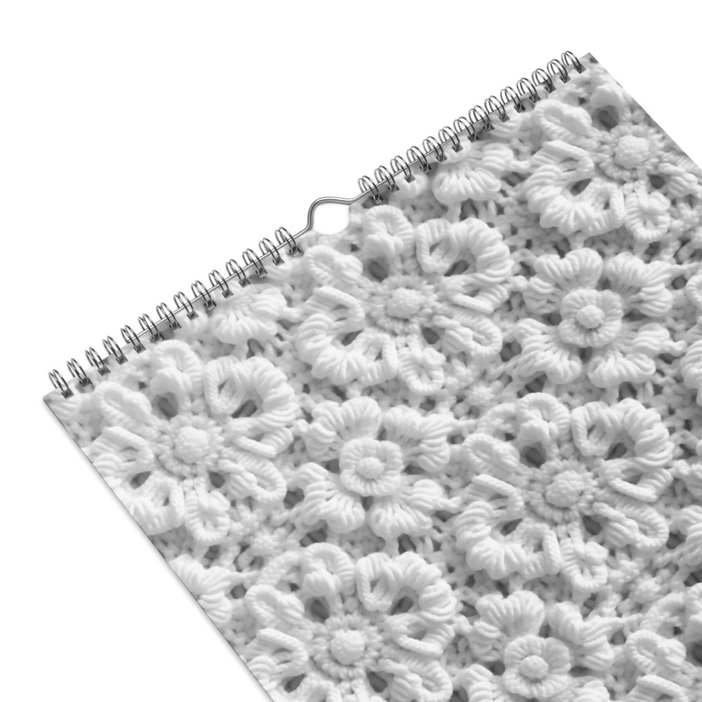 Spiral-bound notebook with a floral pattern cover.