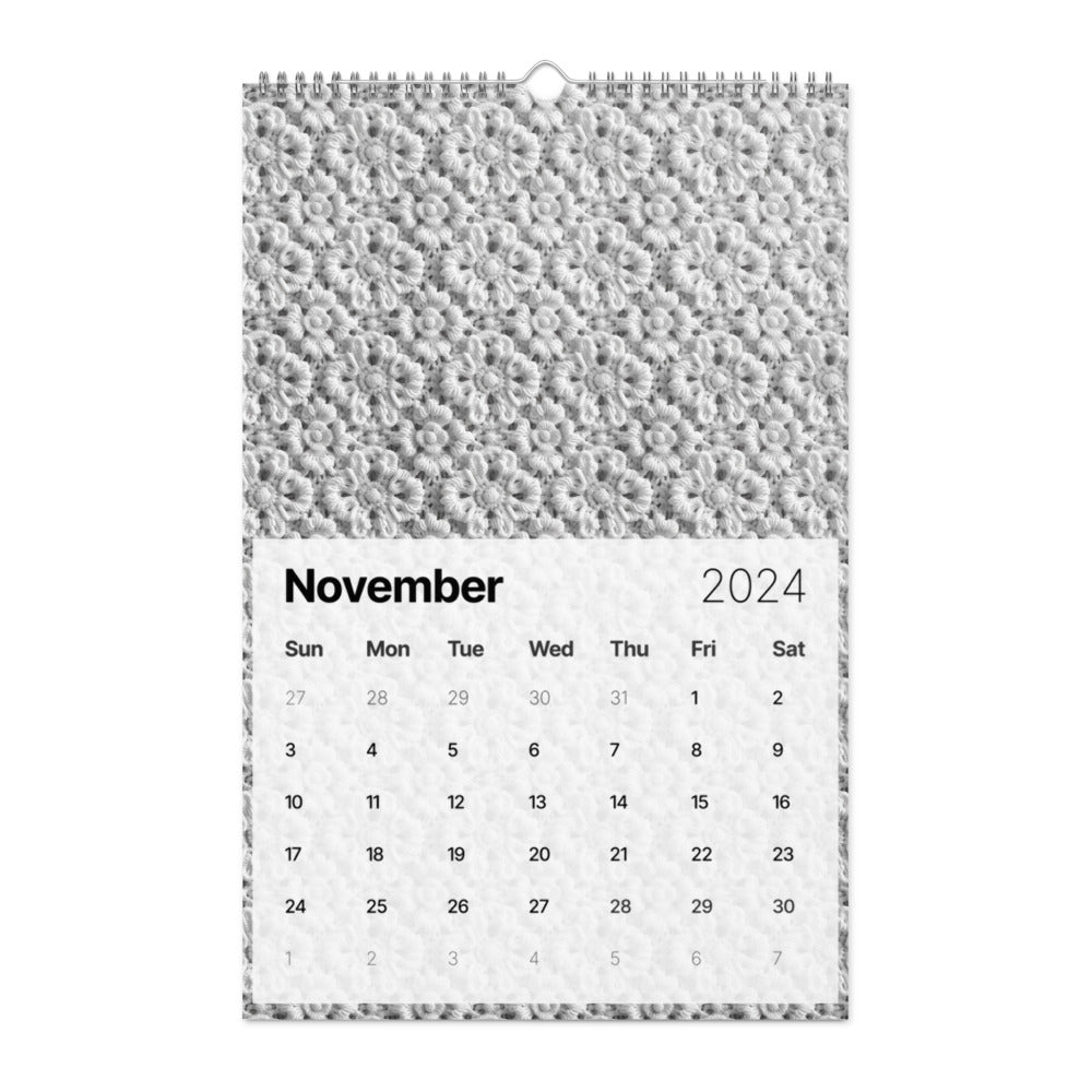 Calendar page for November 2024 with a textured pattern above.