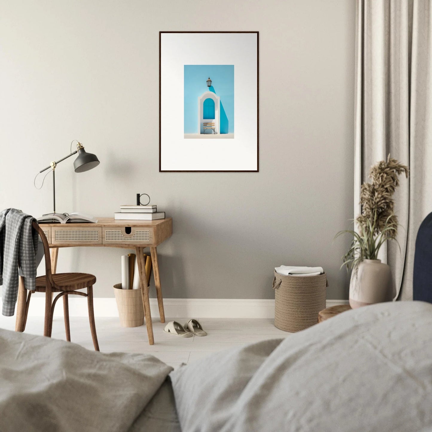 Framed blue and white architectural photograph on light gray wall, Ethereal Mediterranean Pause