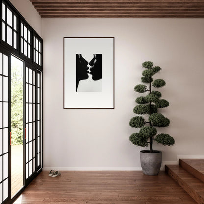 Black and white silhouette of two faces kissing in Luminous Midnight Kiss framed art